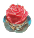 Rosa fucsia en soporte de cristal transparente con forma de flor